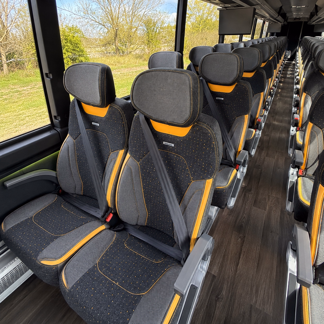how seasonality and peak times affect charter bus rates in troy michigan